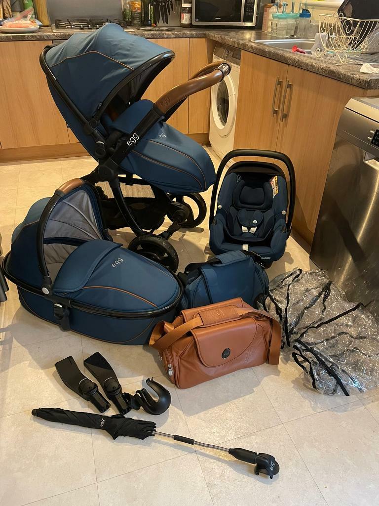 petrol blue egg pram